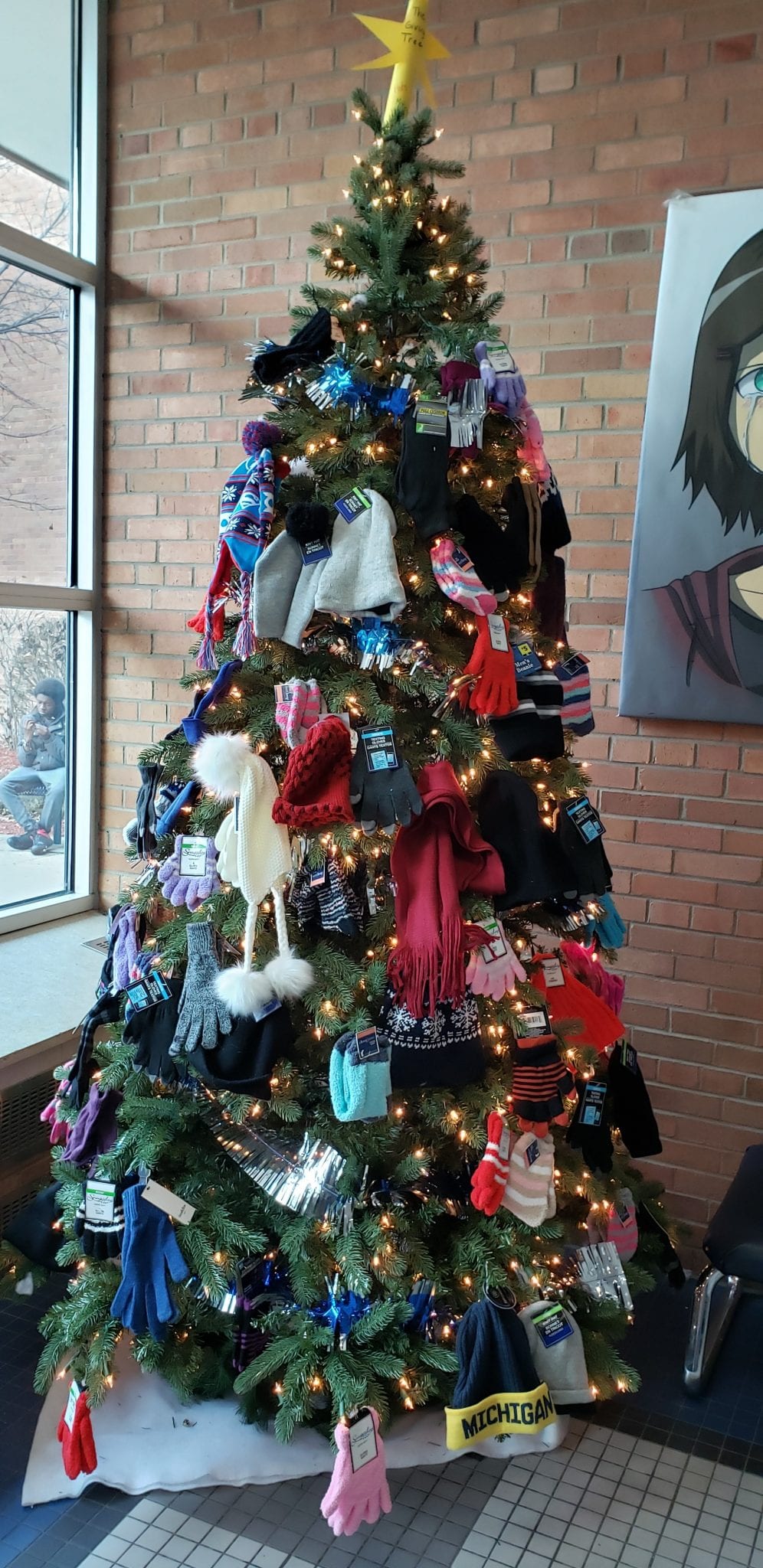 Xmas tree with hats, gloves and scarves.